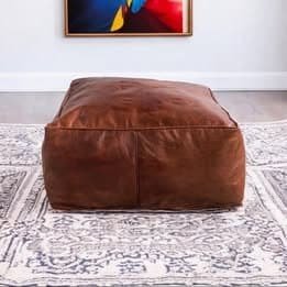 Brown leather pouf