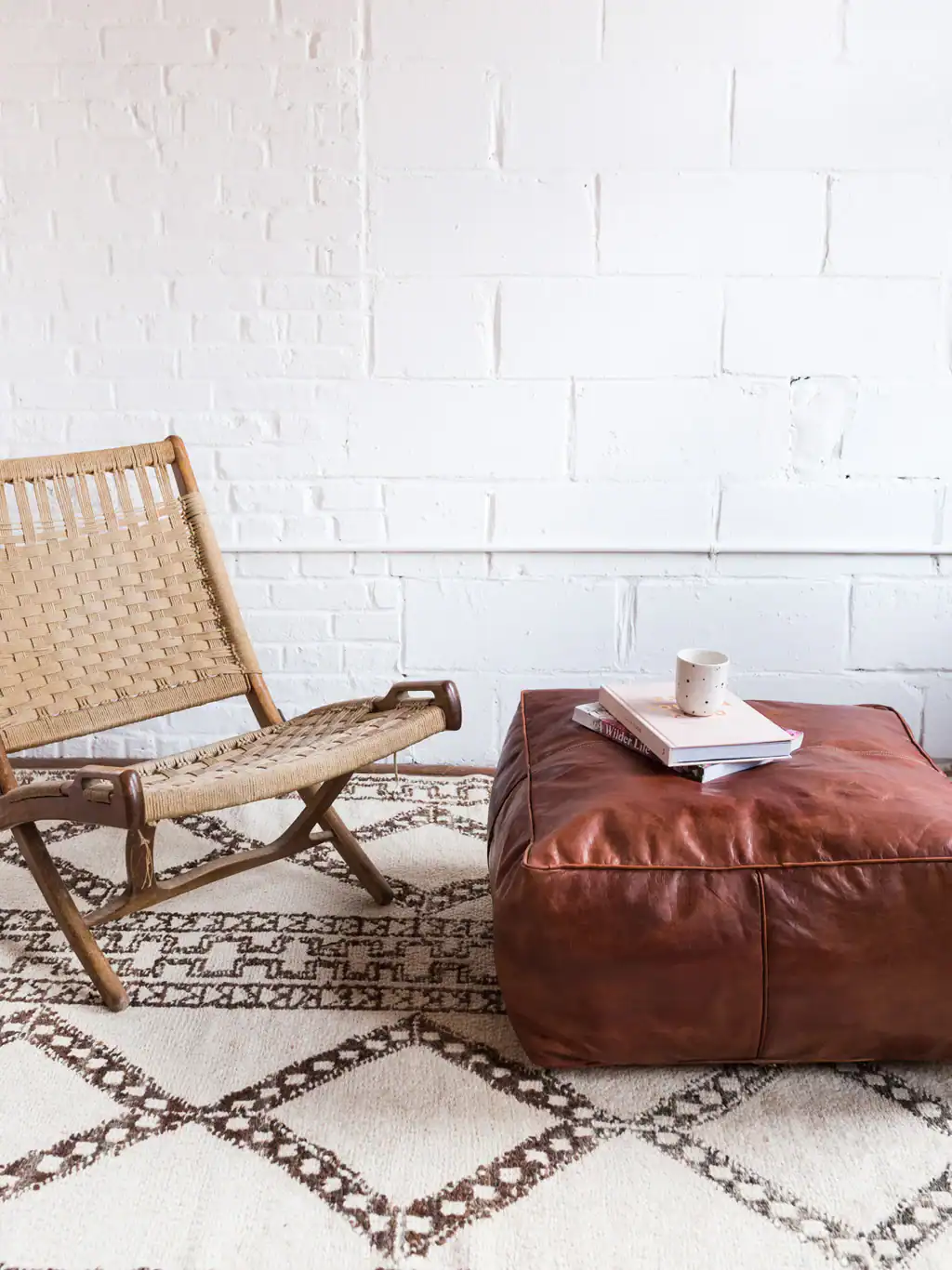 Brown leather pouf Brown leather pouf