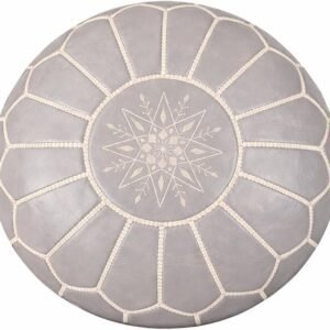Elegant Moroccan brown leather ottoman with gold accents and intricate stitching.